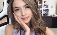 A selfie of Twitch streamer Pokimane posing on her gaming chair
