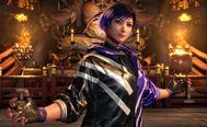 Reina is standing in front of a statue in Tekken 8