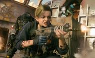 Image showing Vanguard player crouching and holding gun
