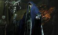 Image from Resident Evil 4 of Osmund Saddler wearing a blue rope and holding a staff.